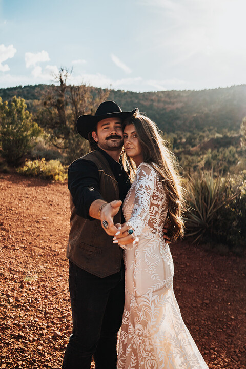 Bride and groom dance during Sedona elopement photos