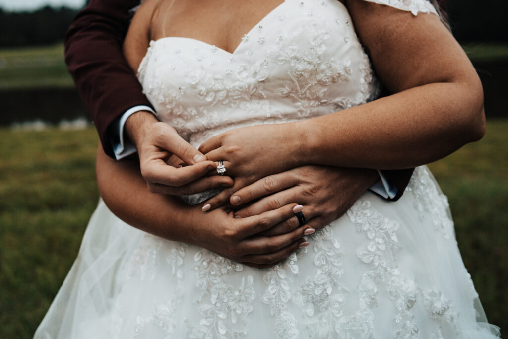 wedding rings bride and groom photo